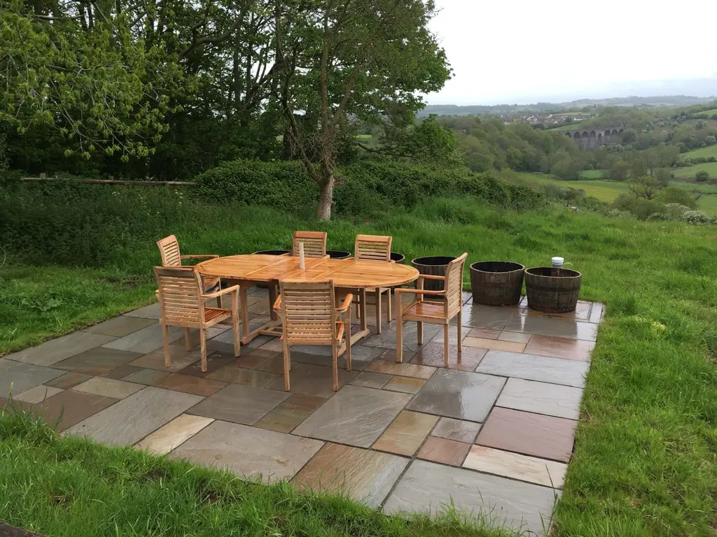 How Do You Design a Family Garden Without Plastic Clutter? - Monkey Business Design, Bristol