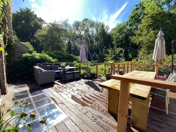 Large Accoya deck with skylight and Larch balustrade at Mill House - Monkey Business Design
